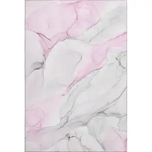 Photo of Pink And Ivory Abstract Washable Area Rug With UV Protection