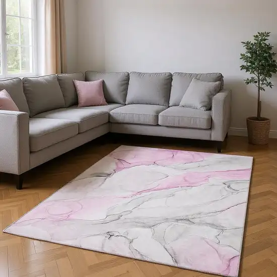 Pink And Ivory Abstract Washable Area Rug With UV Protection Photo 2