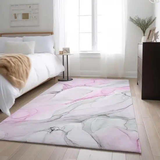 Pink And Ivory Abstract Washable Area Rug With UV Protection Photo 5