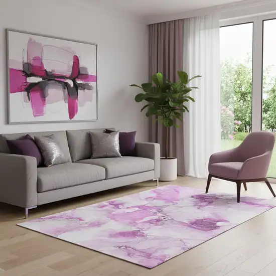 Pink And Ivory Abstract Washable Area Rug With UV Protection Photo 1
