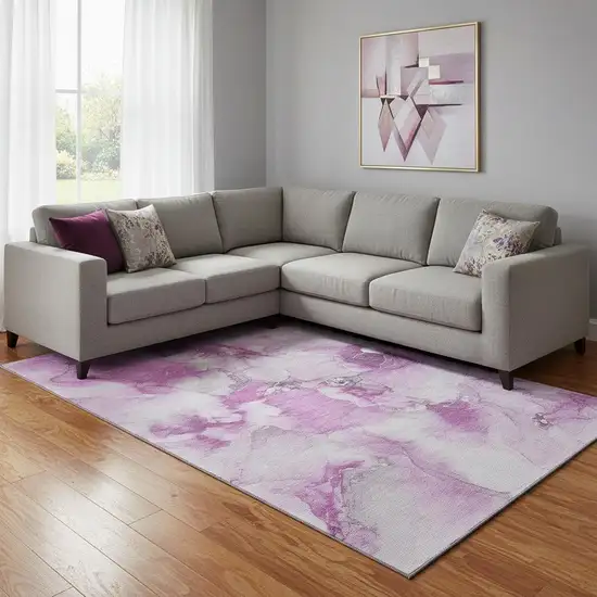 Pink And Ivory Abstract Washable Area Rug With UV Protection Photo 1