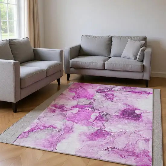 Pink And Ivory Abstract Washable Area Rug With UV Protection Photo 2