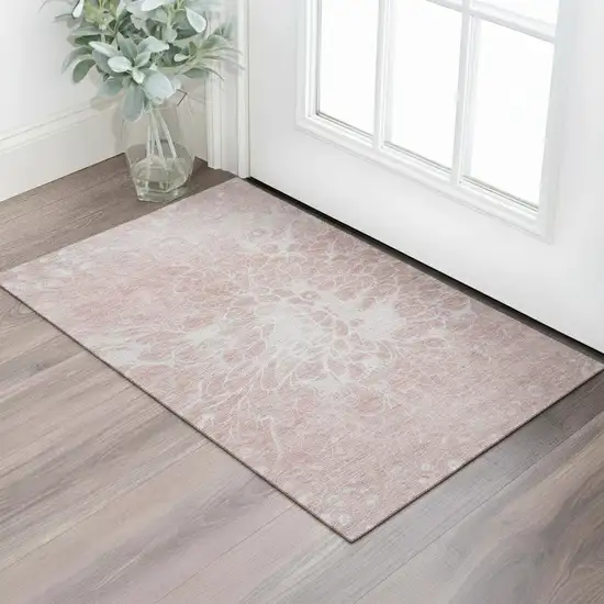 Pink And Ivory Abstract Washable Area Rug With UV Protection Photo 1