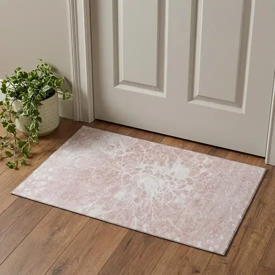 Pink And Ivory Abstract Washable Area Rug With UV Protection Photo 1