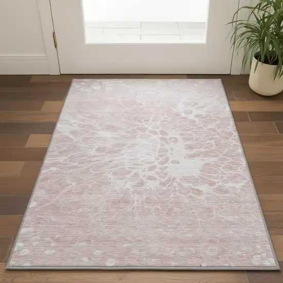 Pink And Ivory Abstract Washable Area Rug With UV Protection Photo 3