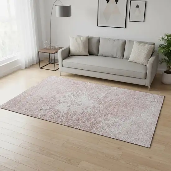 Pink And Ivory Abstract Washable Area Rug With UV Protection Photo 1