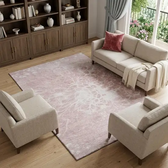 Pink And Ivory Abstract Washable Area Rug With UV Protection Photo 1