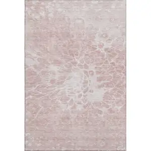 Photo of Pink And Ivory Abstract Washable Area Rug With UV Protection