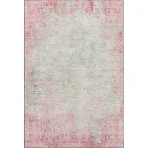 Photo of Pink And Ivory Abstract Washable Area Rug With UV Protection
