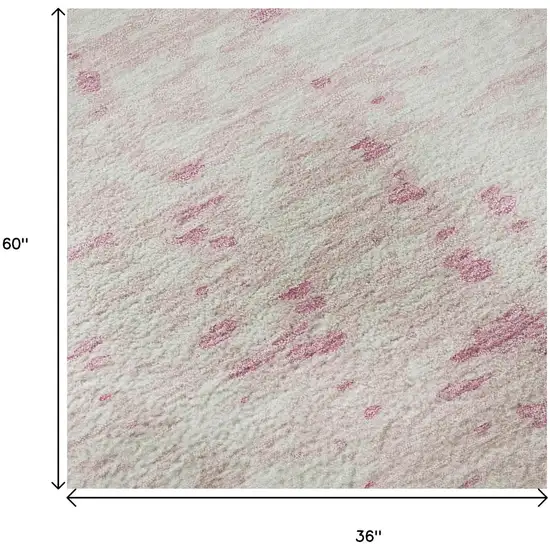 Pink And Ivory Abstract Washable Area Rug With UV Protection Photo 9