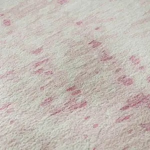 Photo of Pink And Ivory Abstract Washable Area Rug With UV Protection