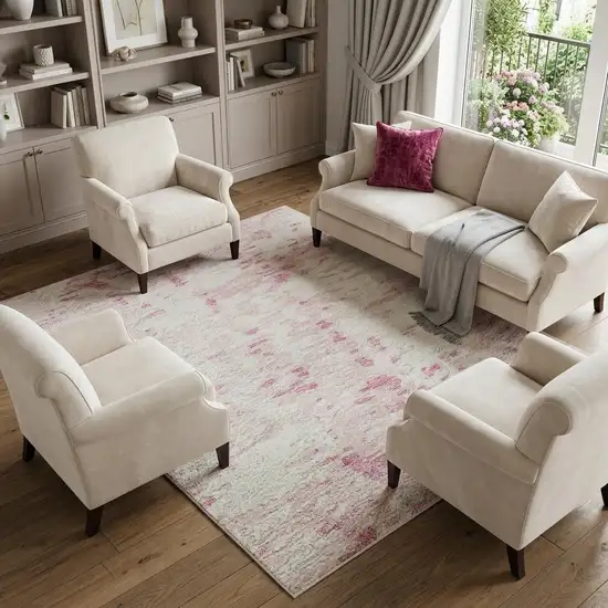 Pink And Ivory Abstract Washable Area Rug With UV Protection Photo 1