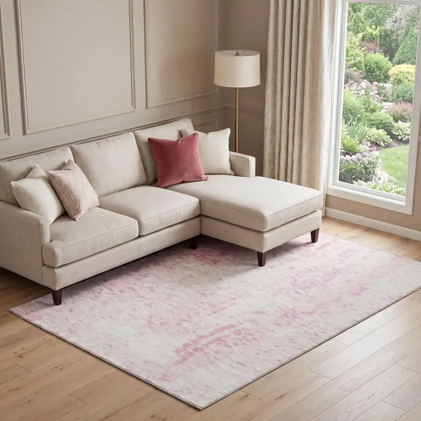 Pink And Ivory Abstract Washable Area Rug With UV Protection Photo 1