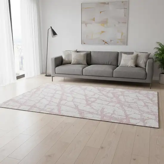 Pink And Ivory Abstract Washable Area Rug With UV Protection Photo 2