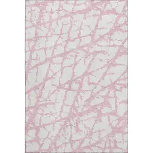 Photo of Pink And Ivory Abstract Washable Area Rug With UV Protection
