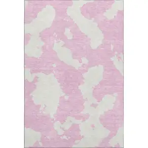 Photo of Pink And Ivory Abstract Washable Area Rug With UV Protection