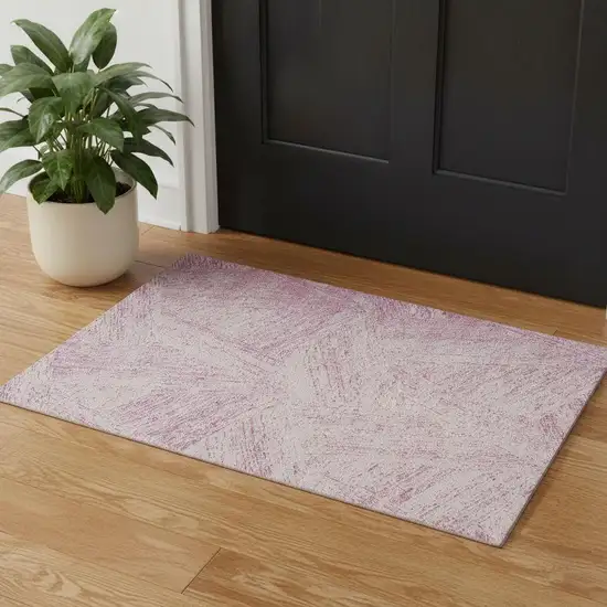 Pink And Ivory Abstract Washable Area Rug With UV Protection Photo 1