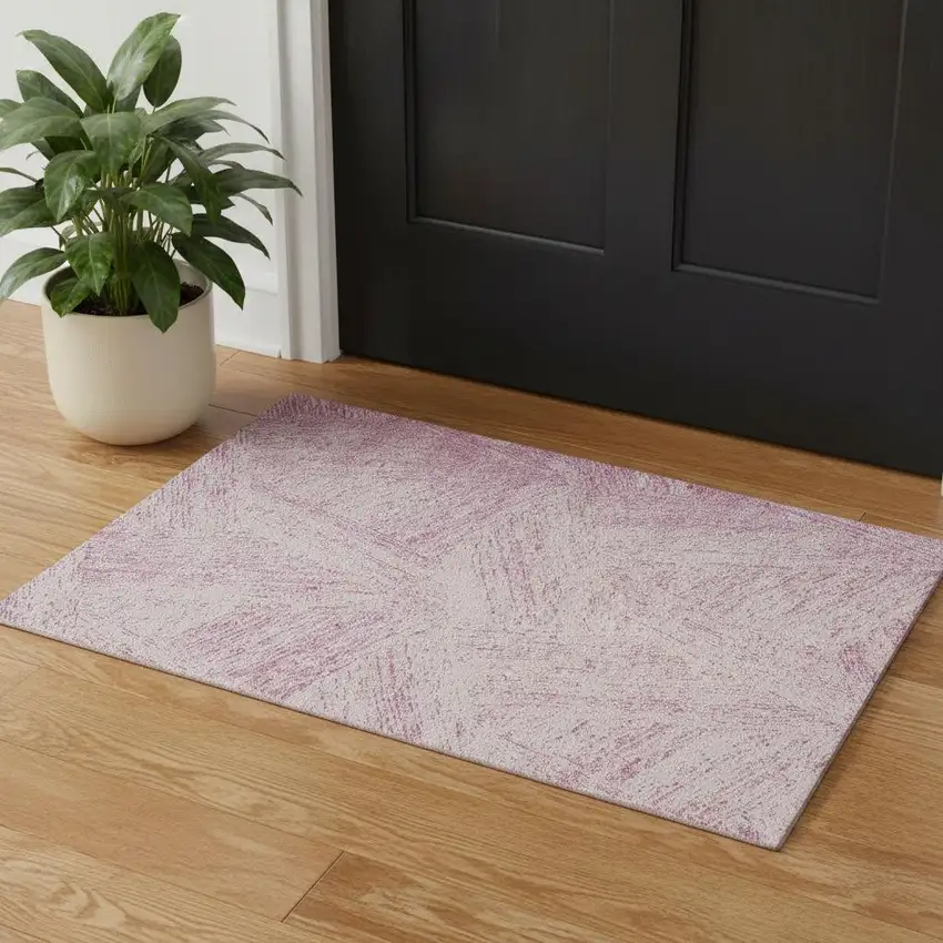 Pink And Ivory Abstract Washable Area Rug With UV Protection Photo 1