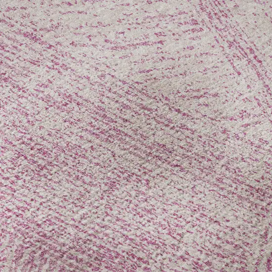 Pink And Ivory Abstract Washable Area Rug With UV Protection Photo 1