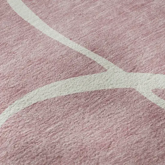Pink And Ivory Abstract Washable Area Rug With UV Protection Photo 1