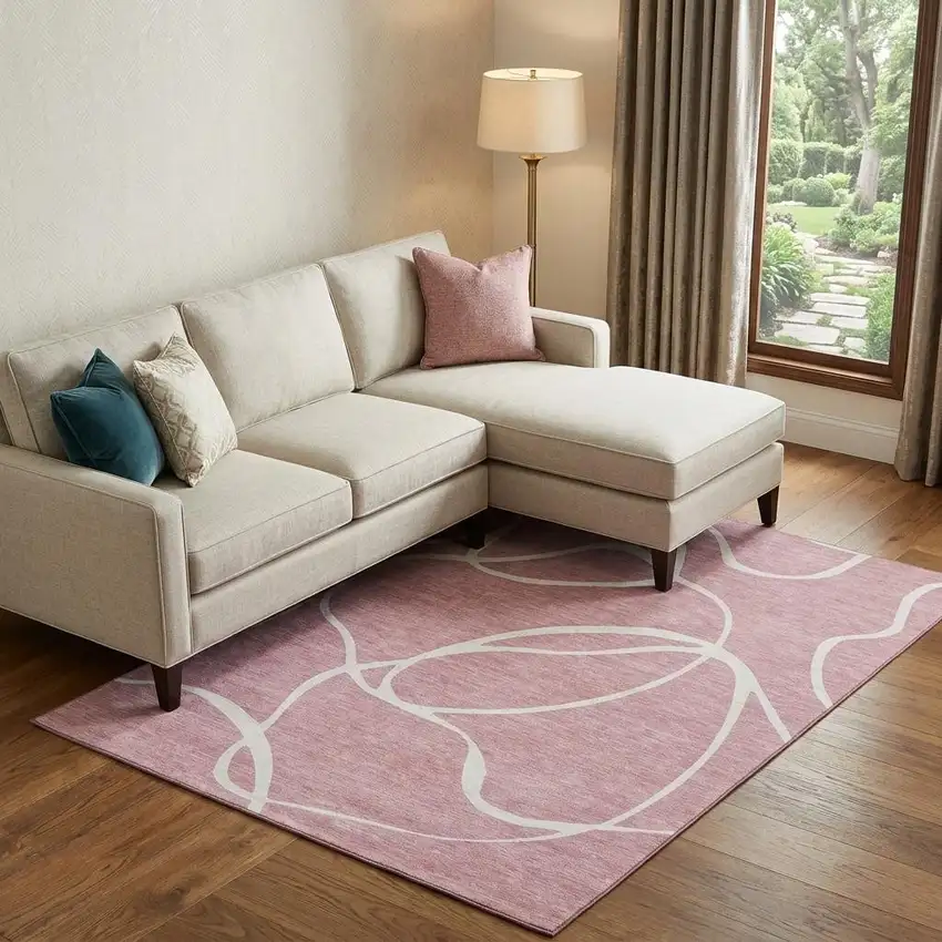 Pink And Ivory Abstract Washable Area Rug With UV Protection Photo 1