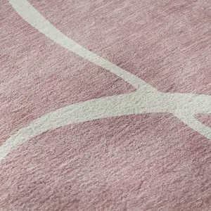 Photo of Pink And Ivory Abstract Washable Area Rug With UV Protection