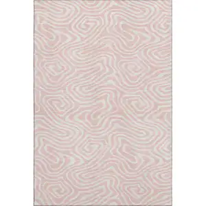 Photo of Pink And Ivory Abstract Washable Area Rug With UV Protection