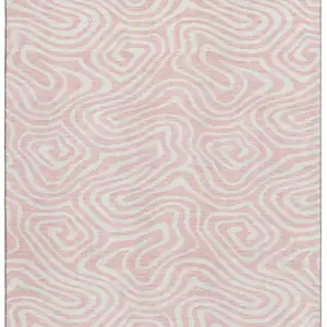 Photo of Pink And Ivory Abstract Washable Area Rug With UV Protection