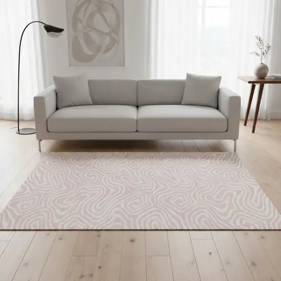 Pink And Ivory Abstract Washable Area Rug With UV Protection Photo 2
