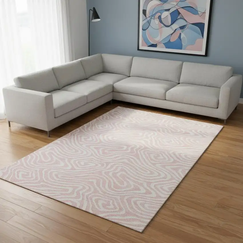 Pink And Ivory Abstract Washable Area Rug With UV Protection Photo 2