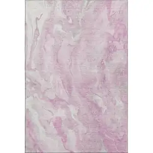 Photo of Pink And Ivory Abstract Washable Area Rug With UV Protection