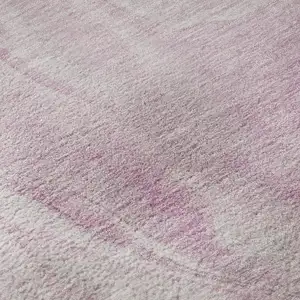 Photo of Pink And Ivory Abstract Washable Area Rug With UV Protection