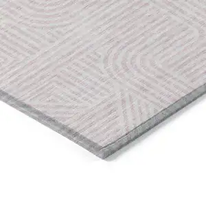 Photo of Pink And Ivory Abstract Washable Indoor Outdoor Area Rug
