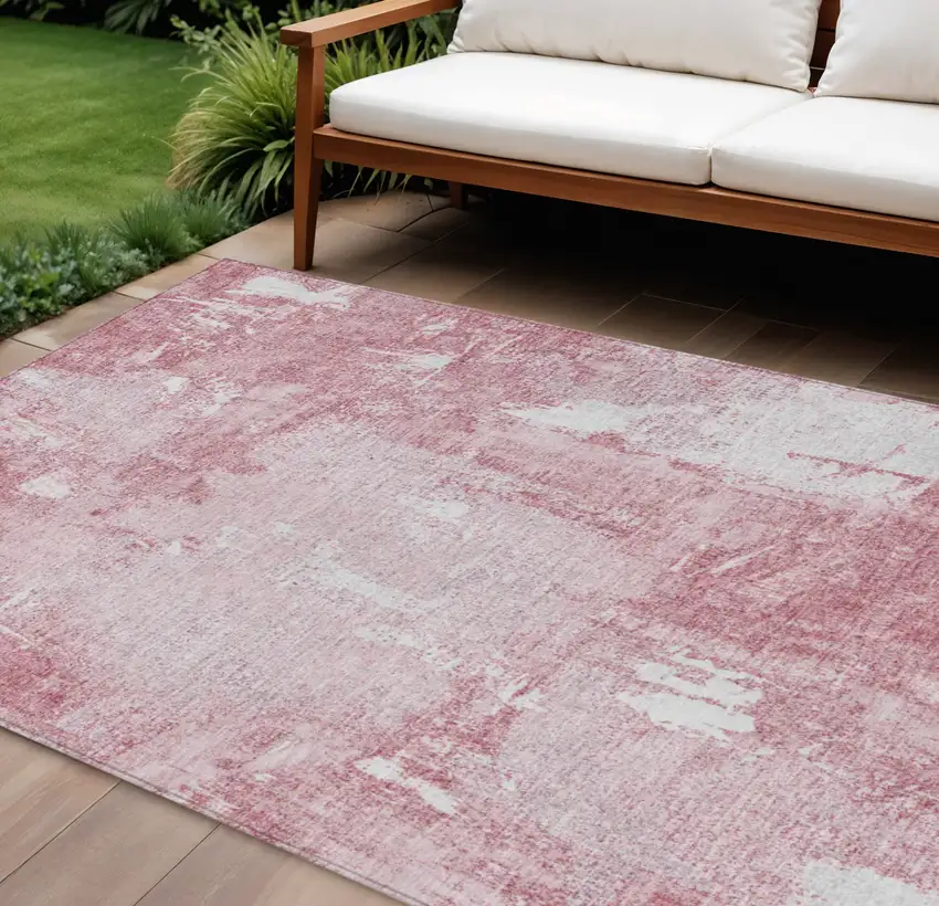 Pink And Ivory Abstract Washable Indoor Outdoor Area Rug Photo 1