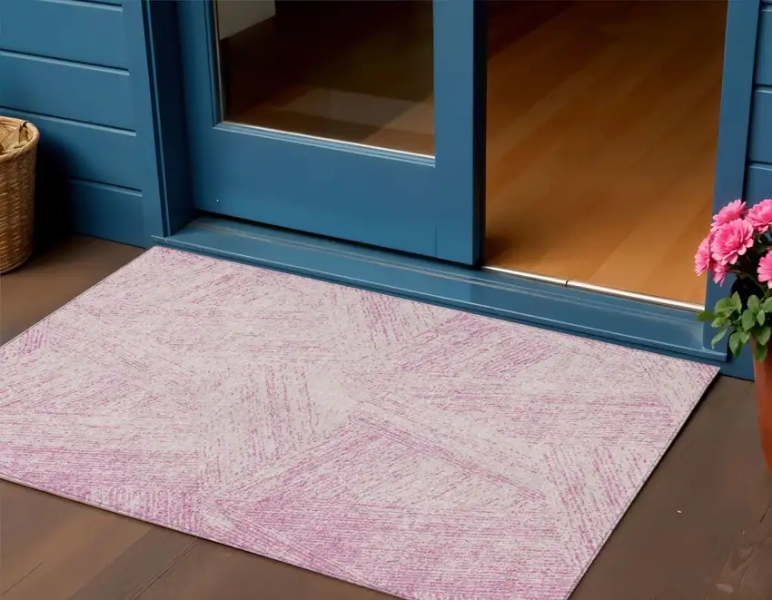 Pink And Ivory Abstract Washable Indoor Outdoor Area Rug Photo 1