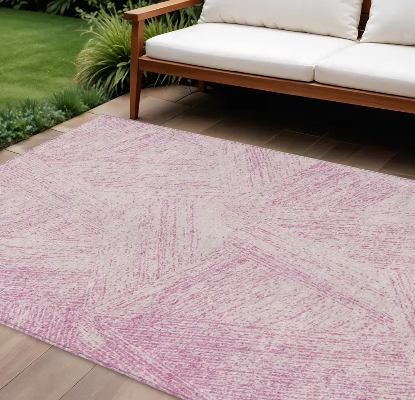Pink And Ivory Abstract Washable Indoor Outdoor Area Rug Photo 1
