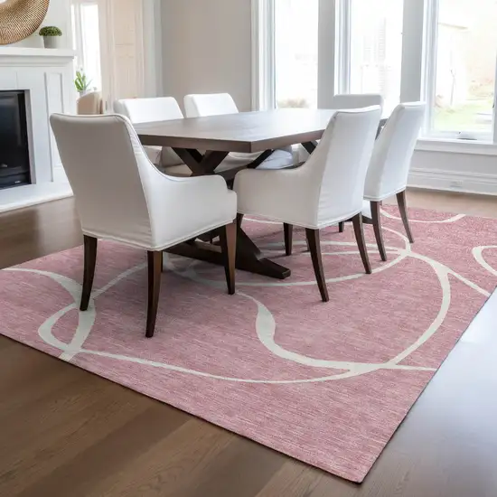 Pink And Ivory Abstract Washable Indoor Outdoor Area Rug Photo 9
