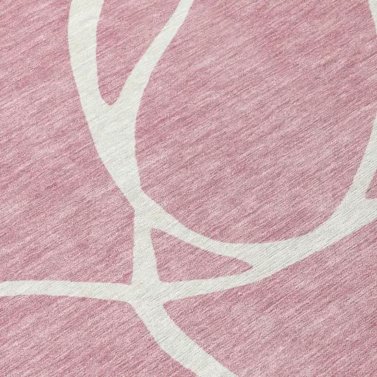 Pink And Ivory Abstract Washable Indoor Outdoor Area Rug Photo 5