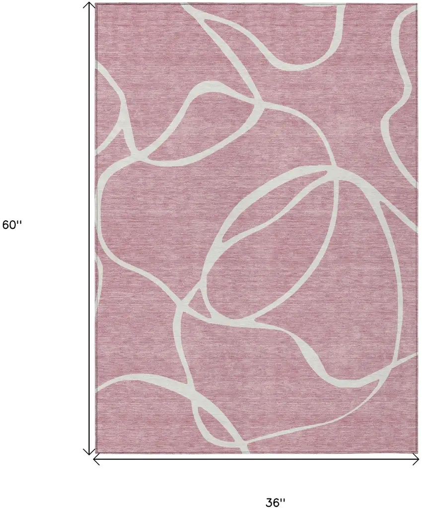 Pink And Ivory Abstract Washable Indoor Outdoor Area Rug Photo 3