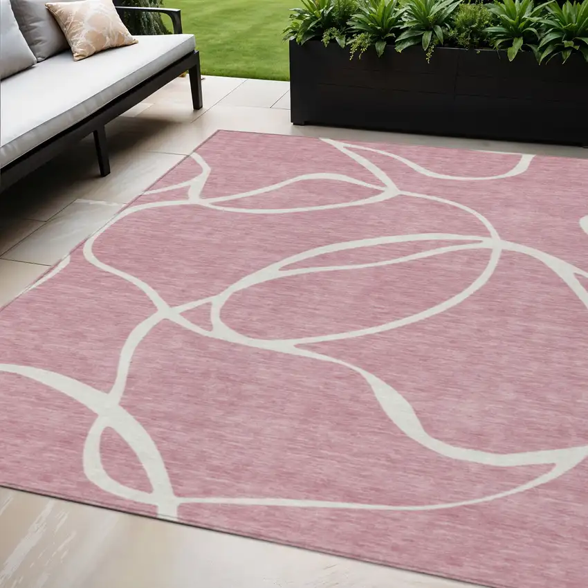 Pink And Ivory Abstract Washable Indoor Outdoor Area Rug Photo 1