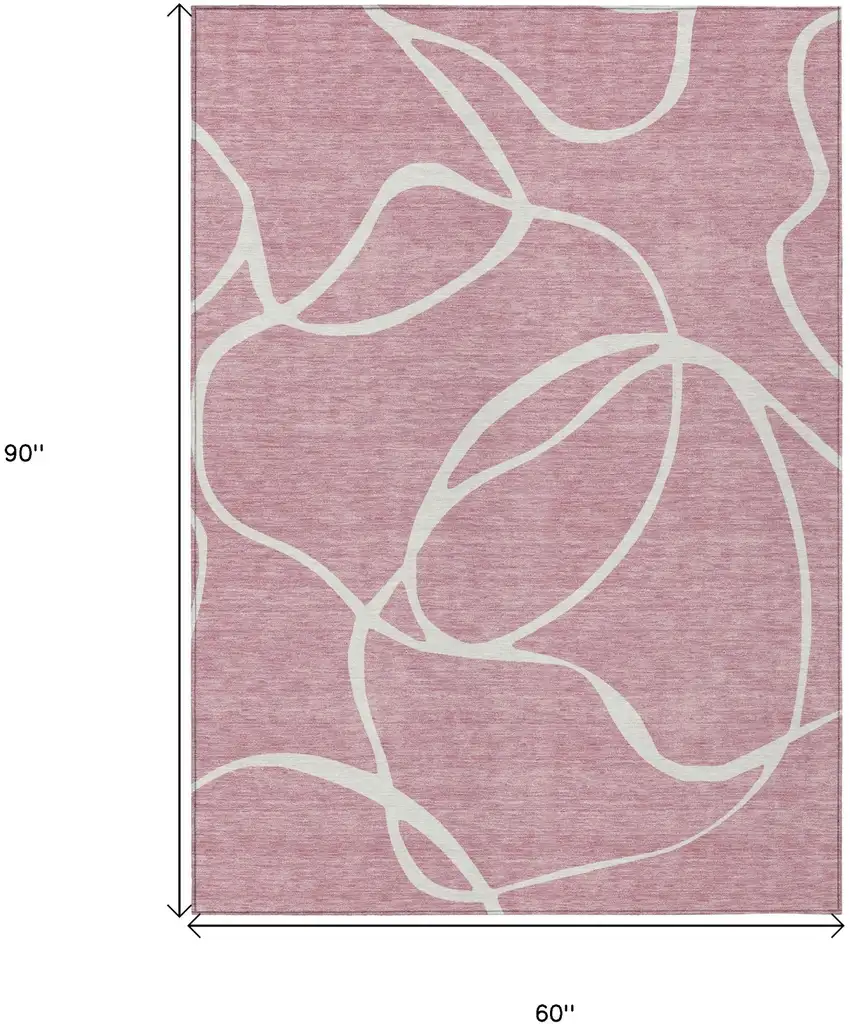 Pink And Ivory Abstract Washable Indoor Outdoor Area Rug Photo 3