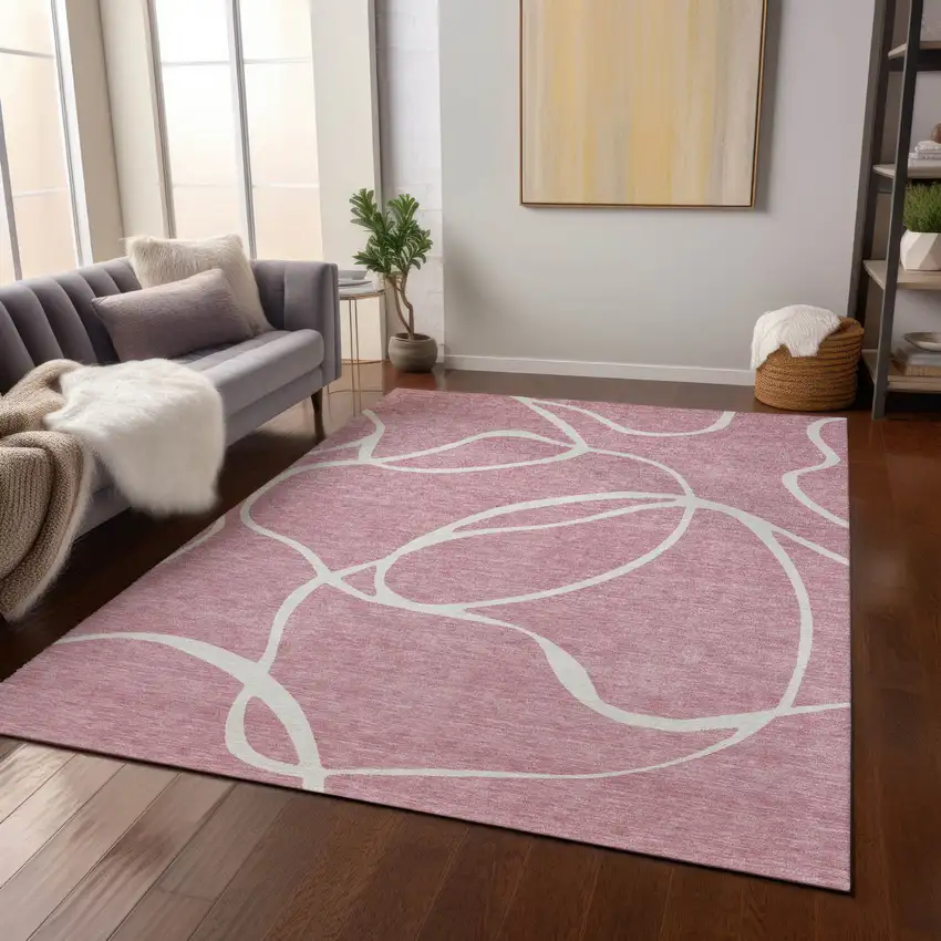Pink And Ivory Abstract Washable Indoor Outdoor Area Rug Photo 9