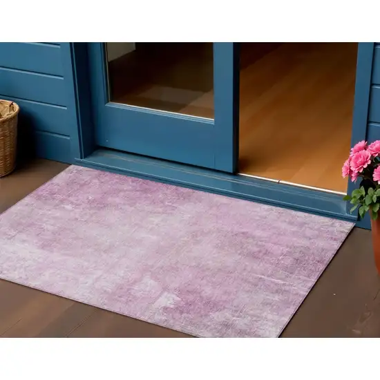 Pink And Ivory Abstract Washable Indoor Outdoor Area Rug Photo 2