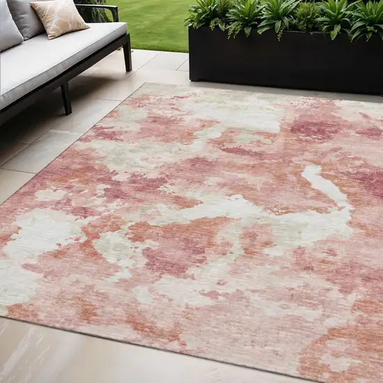 Pink And Ivory Abstract Washable Indoor Outdoor Area Rug Photo 1