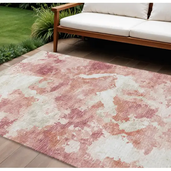 Pink And Ivory Abstract Washable Indoor Outdoor Area Rug Photo 1