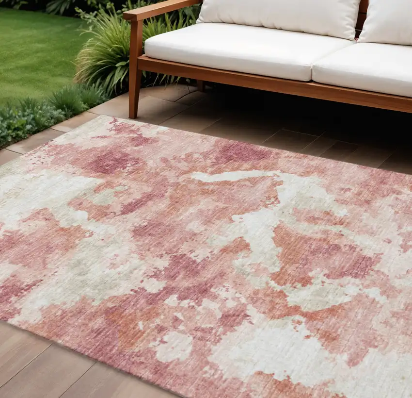 Pink And Ivory Abstract Washable Indoor Outdoor Area Rug Photo 1