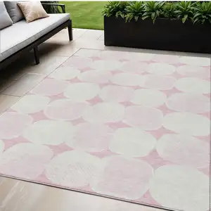 Photo of Pink And Ivory Abstract Washable Indoor Outdoor Area Rug