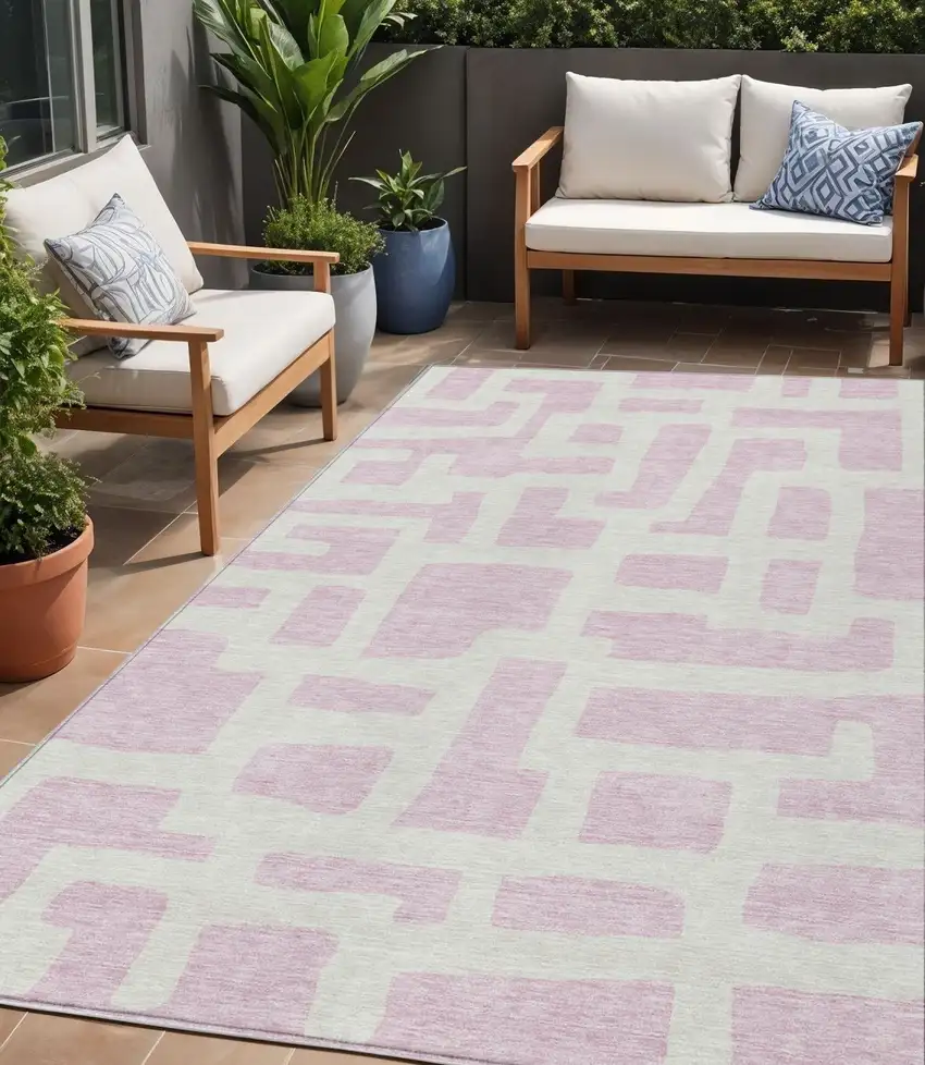 Pink And Ivory Abstract Washable Indoor Outdoor Area Rug Photo 1