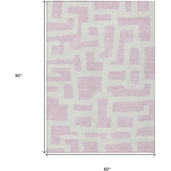 Pink And Ivory Abstract Washable Indoor Outdoor Area Rug Photo 3