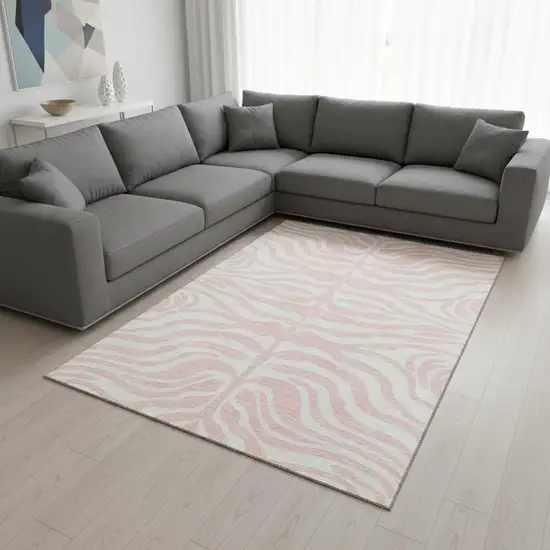 Pink And Ivory Animal Print Washable Area Rug With UV Protection Photo 2